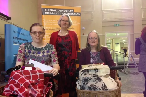 Baroness Judith Jolly, with Claire and Gemma Roulston, at the LDDA stall at Southport conference